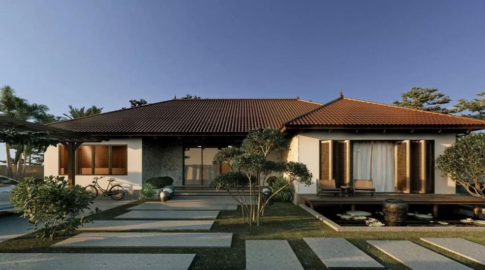Ngôi nhà mái ngói truyền thống với vườn đẹp và hồ nhỏ, lối đi lát đá, kiểu dáng hiện đại, bầu trời trong xanh.