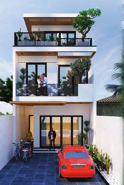 Ngôi nhà hiện đại ba tầng với ban công rộng rãi, xe hơi đỏ và hai xe máy ở sân trước.