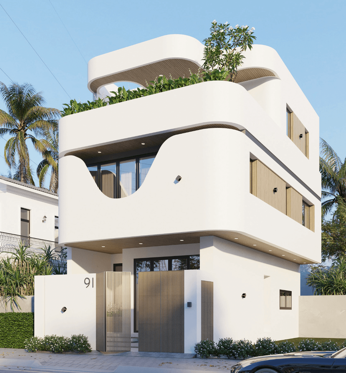 mau-nha-pho-mat-tien-6m-3-tang-dep-doc-ban-1 Nhà hiện đại ba tầng với thiết kế cong và có cây xanh trên tầng thượng, bên ngoài là cây cối xanh mát.