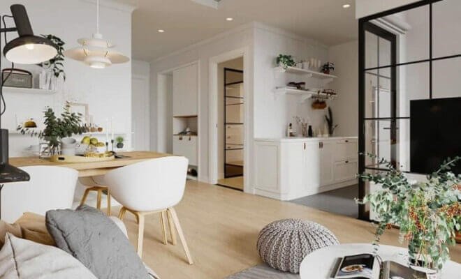 Căn hộ phong cách Bắc Âu, không gian mở với nội thất trắng, bàn ăn gỗ, cây xanh trang trí.