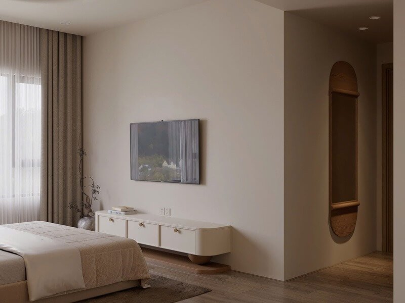 Phòng ngủ hiện đại, tông màu trung tính, tivi treo tường, nội thất tối giản, ánh sáng tự nhiên từ cửa sổ.