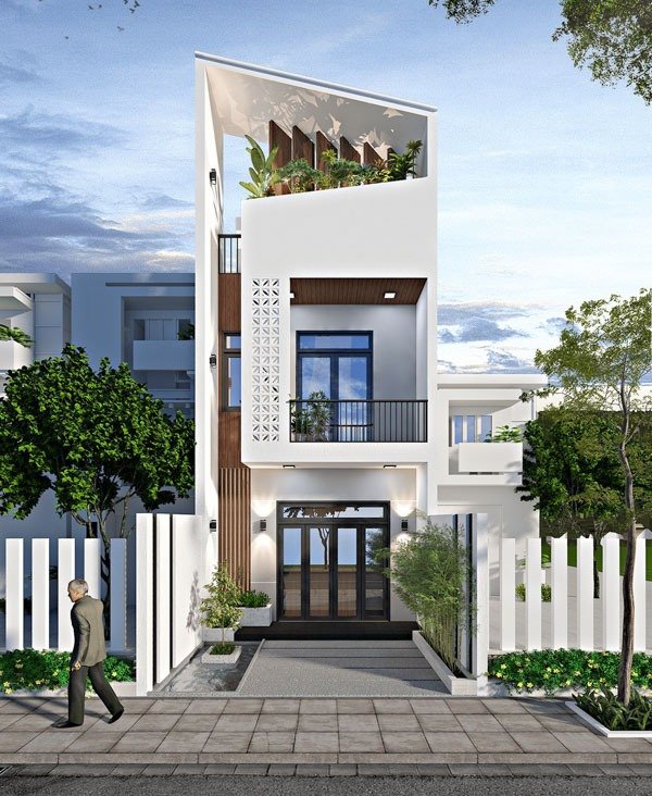 Nhà phố hiện đại 3 tầng, thiết kế kiến trúc sáng tạo với sân thượng trồng cây xanh và mặt tiền thoáng mát.
